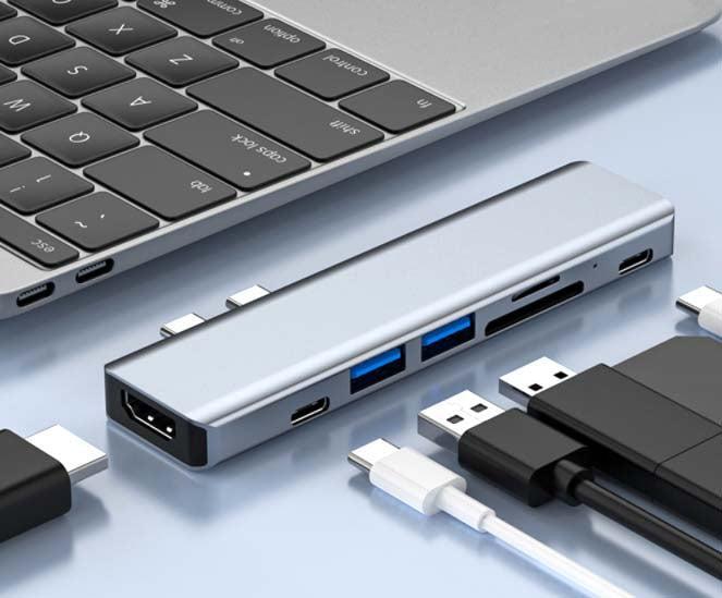 NÖRDIC 2–7 USB-C-telakointiasema MacBook Prolle ja Airille 1xHDMI 4K30Hz 1xUSB-A 3.1 1xUSB-A 2.0 1xUSB-C 3.1 1xUSB-C 100W PD 1x SD/TF-kortinlukija