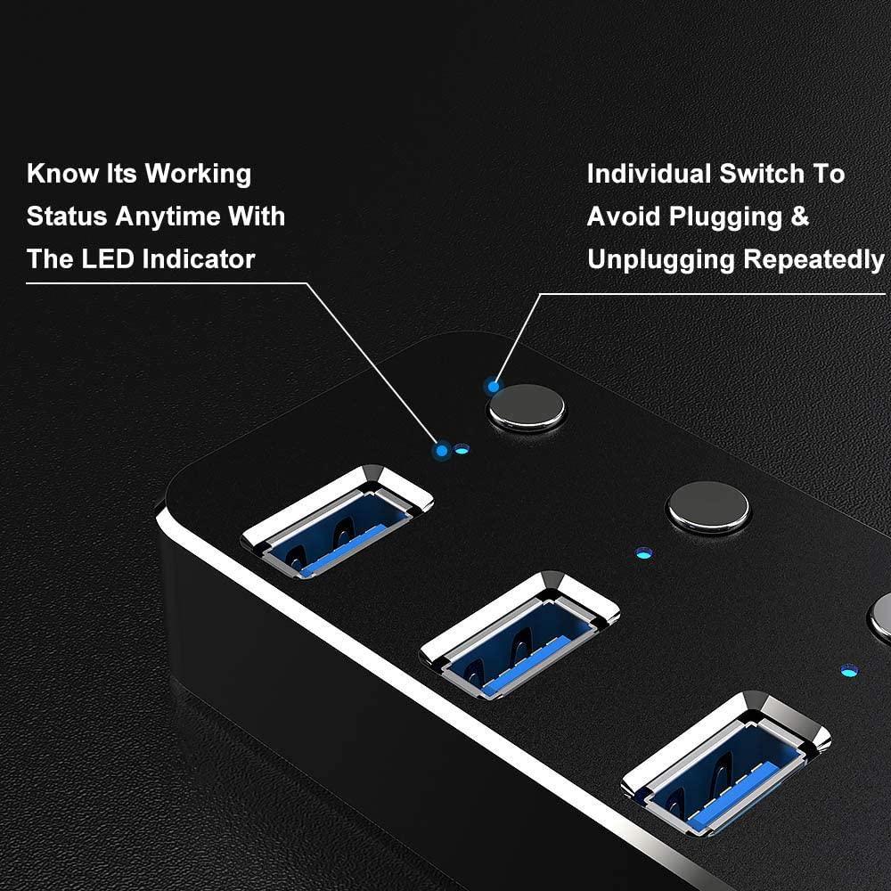 NÖRDIC 4-porttinen keskitin USB-C 3.0 5Gbps yksittäisellä kytkimellä 25cm kaapeli musta alumiini